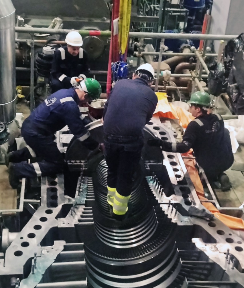 Engineers working on a turbine